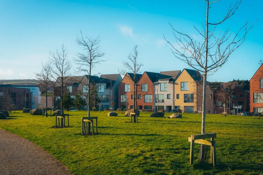 Modern brick and render new build housing estate of the type found around Kirkby and Speke near Liverpool