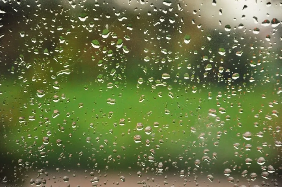 Condensation droplets on a kitchen window of the kind common in Liverpool's solid-wall terraces through winter