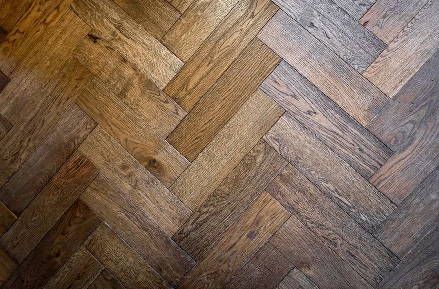 Herringbone engineered oak flooring running through a Liverpool kitchen diner