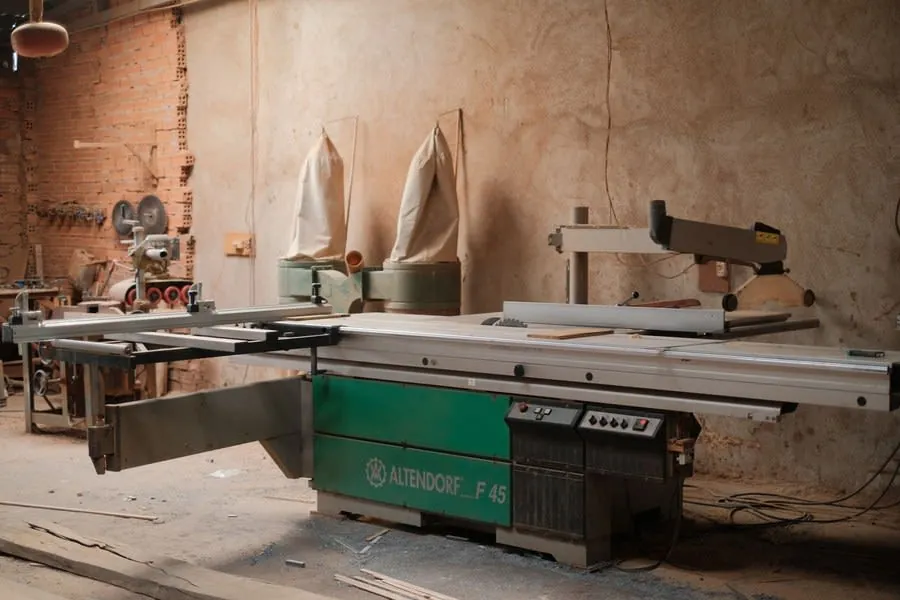 Joinery workshop with a sliding table saw and sheet material