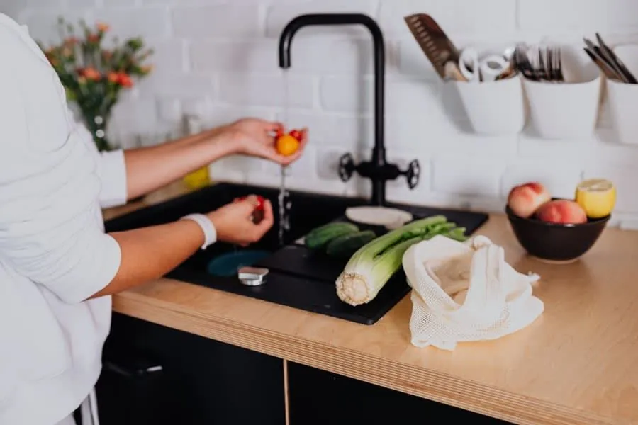 Kitchen sink and drainer with worktop space in a compact rental kitchen