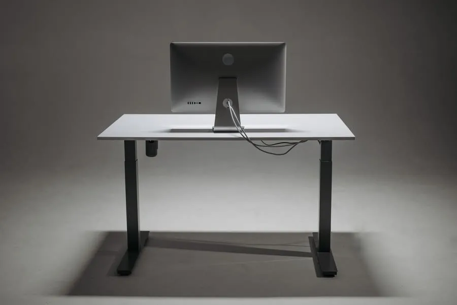 Rear view of a fitted desk showing a cable tray and tidy cable management