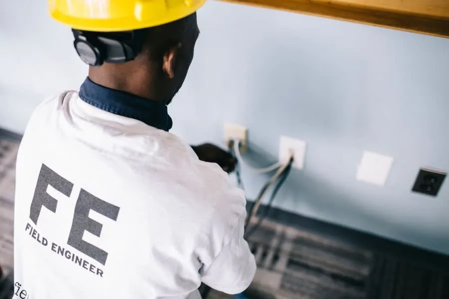 Electrical first fix work behind a kitchen wall in a Liverpool house