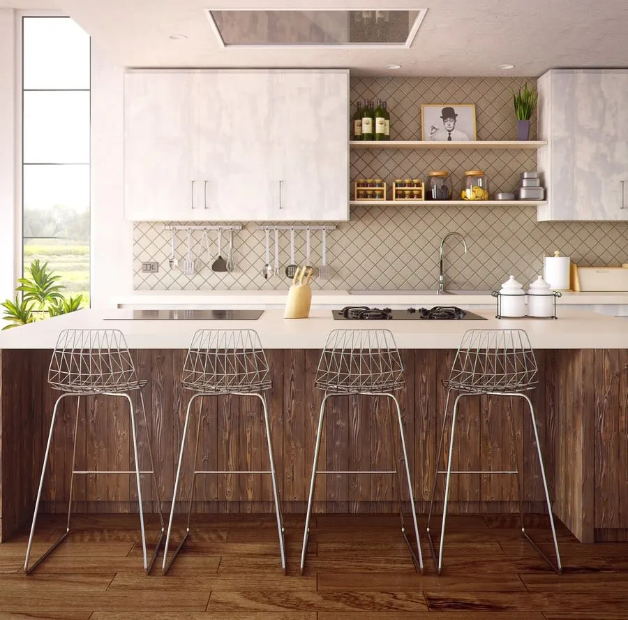 Modern kitchen with white cabinets, wood island, wire bar stools, and patterned tile backsplash