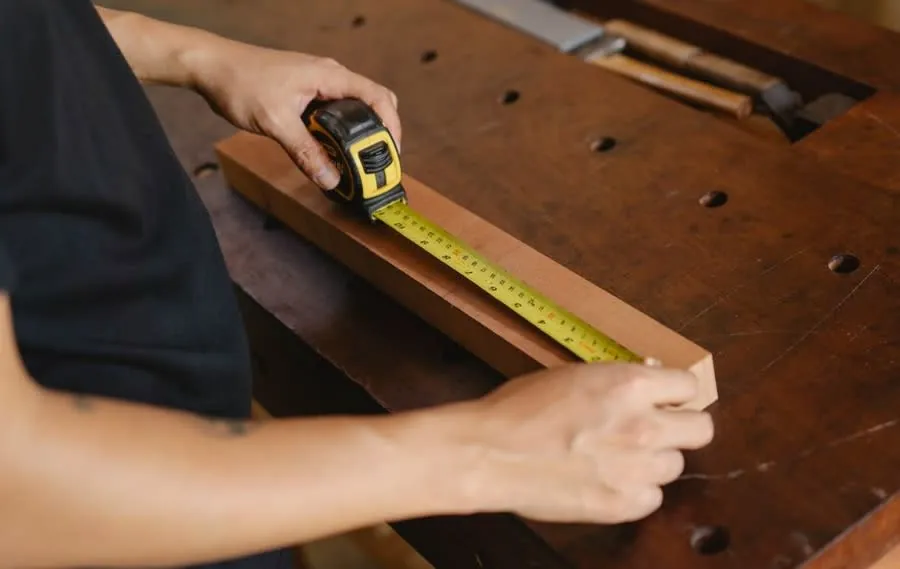 Measuring up during kitchen planning to keep new service runs as short as possible