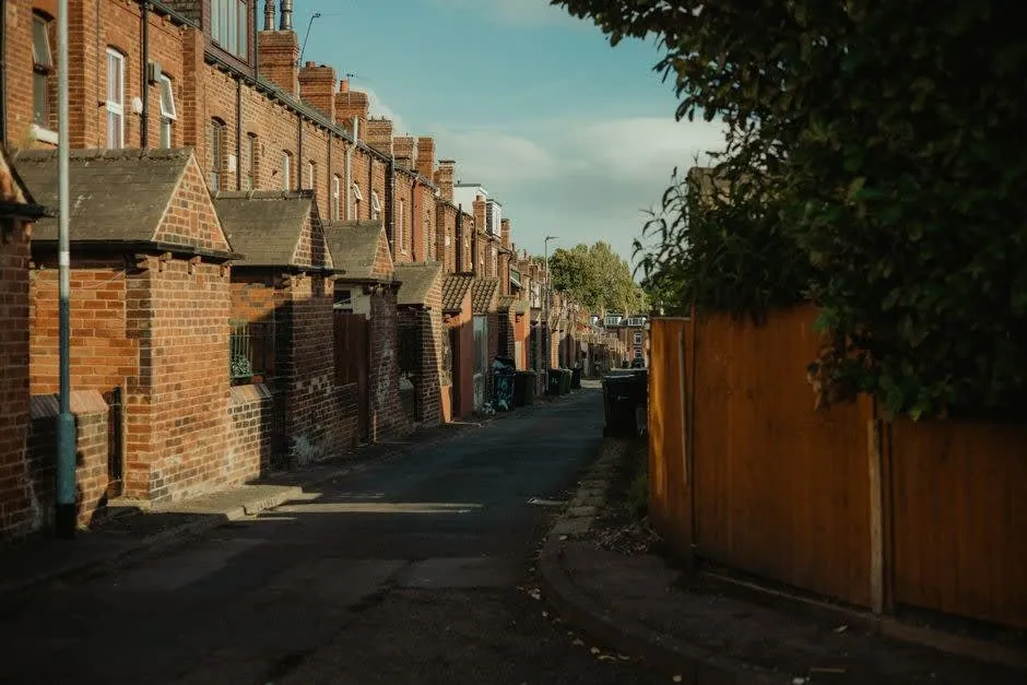 Red brick terraced houses on a northern English street of the type widely rented in Liverpool