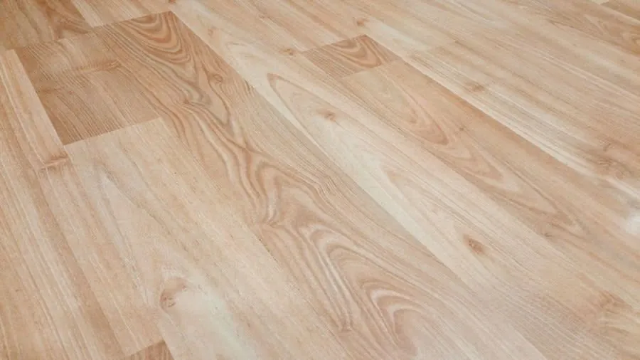 Light wood-effect plank flooring of the type used for LVT in Liverpool kitchens