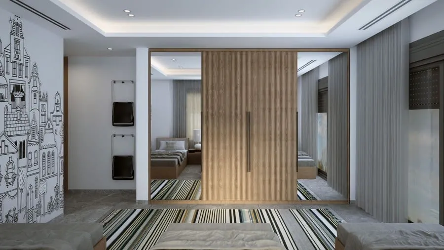 Bedroom with a wooden sliding wardrobe door across one wall