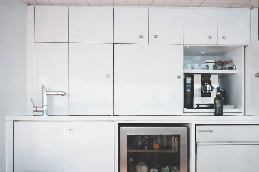 Base units and integrated appliance housings where a water softener would be plumbed in a Liverpool kitchen