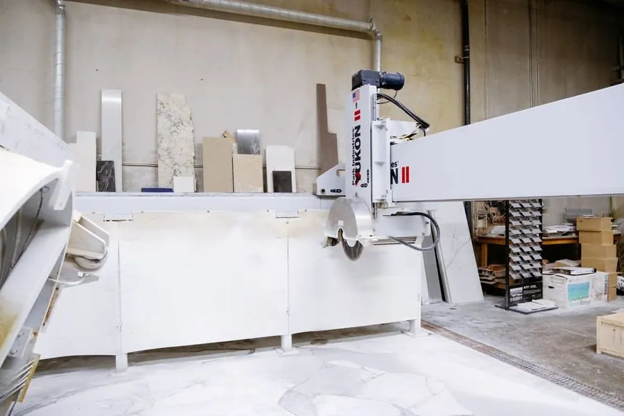 Stone worktop being cut in a fabrication workshop for a Liverpool kitchen