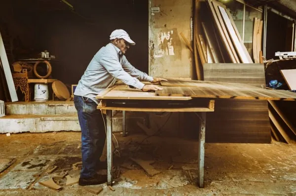 Carpenter working on a joinery project in a workshop