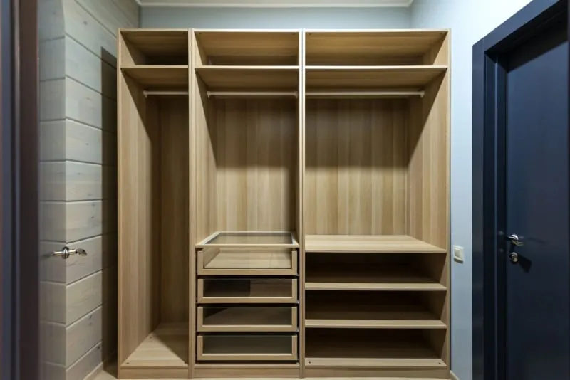 Wardrobe interior with shelves, drawers and hanging space