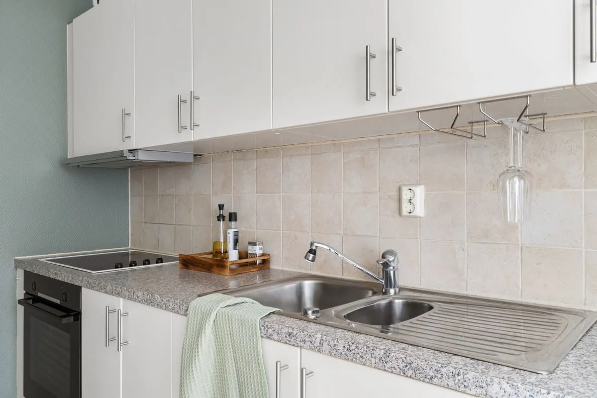 L-shaped and galley kitchen layouts in a Liverpool home