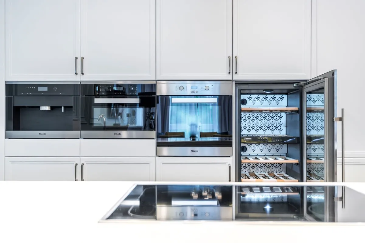 Kitchen with integrated appliances built into fitted units in a Liverpool home
